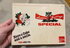 Have a Coke and a Smile Advertising Paper Seasons Greetings Special (read)