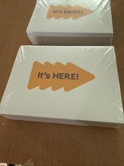 2 Packages of “It’s Here” Arrow Stickers – See Description