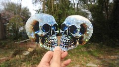 Pack of 2 – 4″ HOLOGRAPHIC Facing SKULLS Stickers BIG 4 inch skull STICKERS