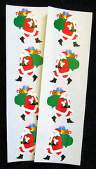 Mrs Grossman Two Vintage 2×6 inch Sheets ‘Santa’ Stickers (c-1994)