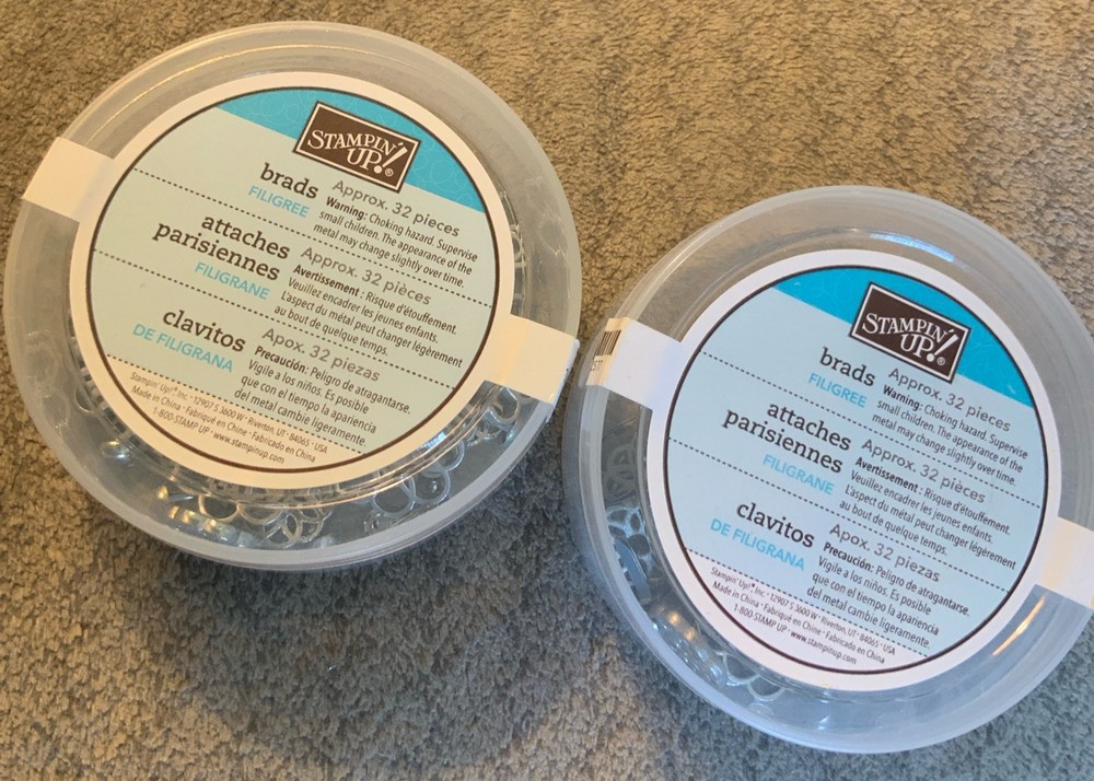 Two Containers Of New Stampin’ Up! Filigree Brads