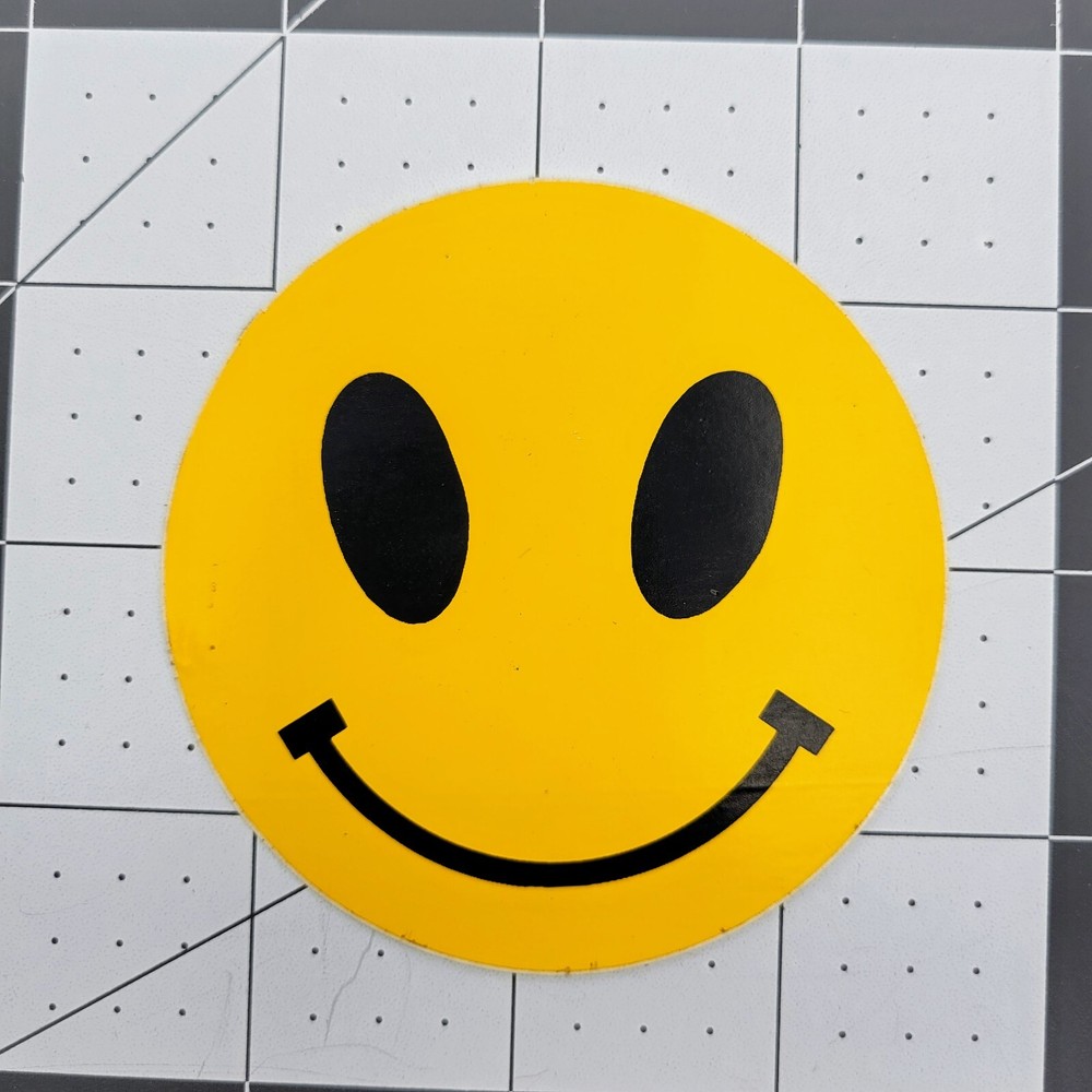 Yellow Smiley Face 3″ Decal, Alien Eyes, Black on Yellow – Crafts Sticker