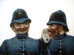 Fantastic Vintage Die Cut of Five British Peace Officers Locking Arms *
