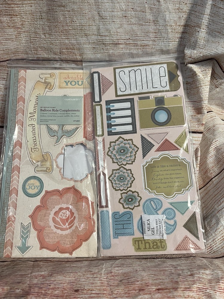 2 packages of scrapbooking embellishments-NEW