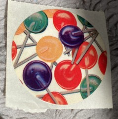 Vintage 1982 Lisa Frank 2” circle sticker of lollipops