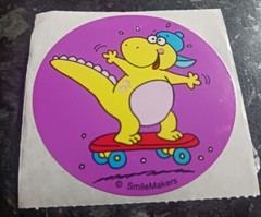 Vintage Sticker Smilemakers Dinosaur Riding A Skateboard 2.5″x2.5″