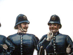 Fantastic Vintage Die Cut of Five British Peace Officers Locking Arms *