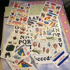 scrapbooking travel stickers and letters