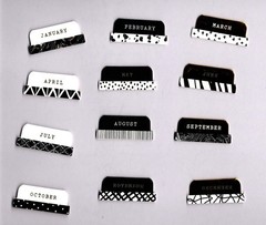 Paper Studio BLACK/WHITE MONTHLY FOILED ADHESIVE CARDSTOCK TABS (12pk)
