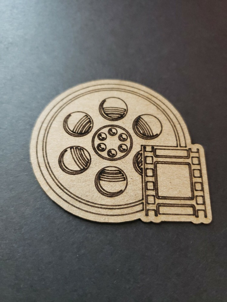 Chipboard Scrapbooking laser scored and cut die cut embellishment movie reel #1