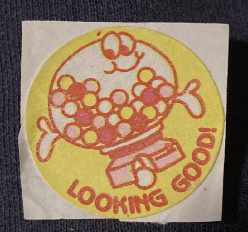 Vintage 1980’s 1.5” circle matte sticker gumball machine Looking Good! Sticker