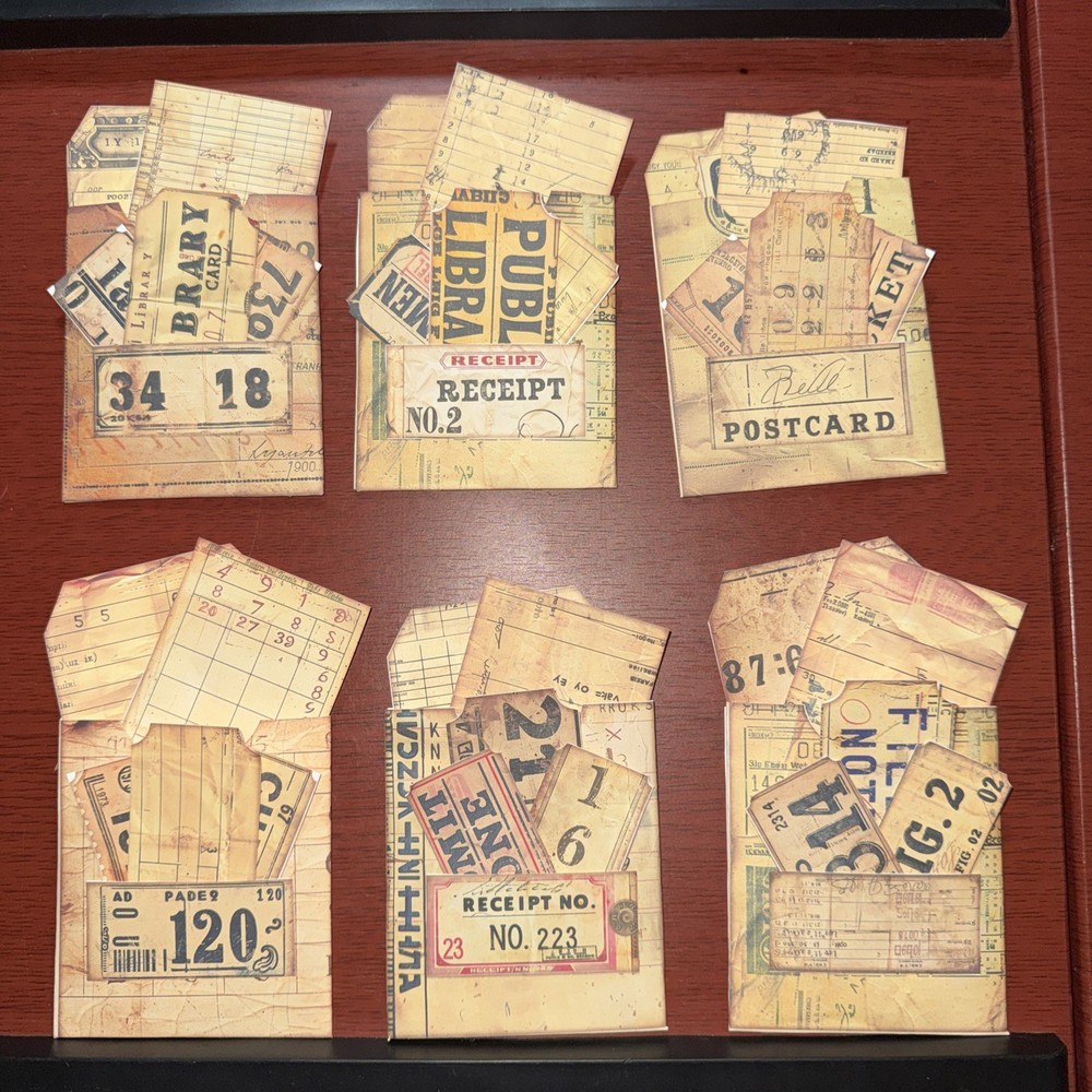 One Hand made junk journal vintage library ￼ pocket with tags ￼￼￼