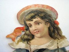 Lovely 1800’s Die Cut of Child Holding a Boat Filled w/ Pink & White Roses *