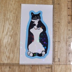 Well-fed Tuxedo cat laying on its back – Holographic Sticker