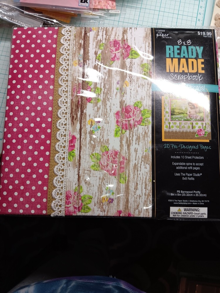 Pre made Paper Studio 8×8 scrapbook plus embellishments