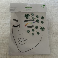 Claire’s Face Stickers St. Patricks sheet of glittery shamrocks and a rainbow.