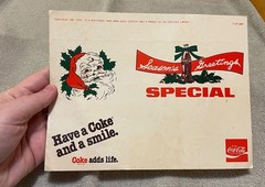 Have a Coke and a Smile Advertising Paper Seasons Greetings Special (read)