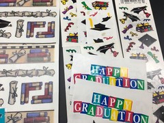 Graduation lot of 200+ Stickers and Die cuts in 3 hole plastic sleeve