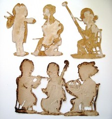 (1) Set of (6) 1800’s Musician Die Cuts Holding Their Instruments *