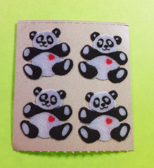 vintage 80’s Sandylion fuzzy brown backing pandas sticker module