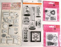 BRAND NEW-SEALED-STAMPS ! MIXED LOT OF 11 . A CRAFT THAT I NEVER EVEN STARTED!