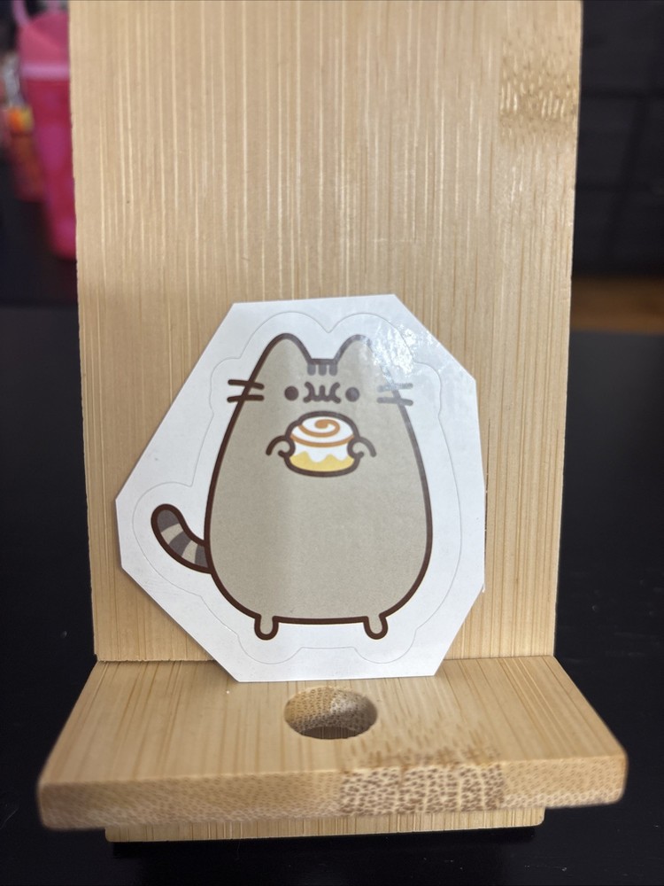 Pusheen Cat with Cinnamon Roll Sticker 2.25 inches H x 2 inches W