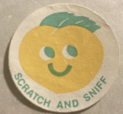 Vintage 1980’s 1.5” circle sticker matte scratch n sniff orange