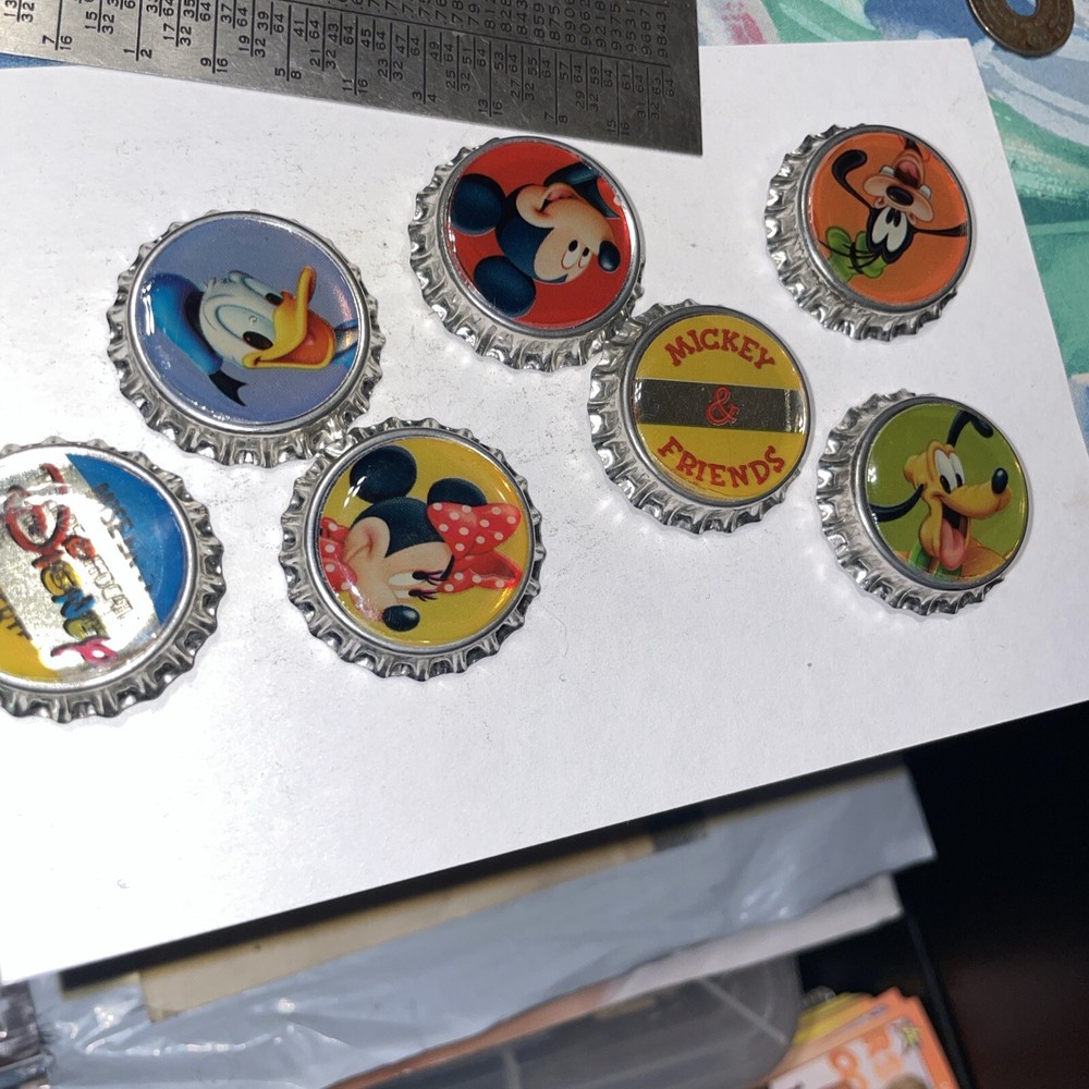 7-DISNEY Mickey, Minnie, Pluto, Goofy, Donald, ADHESIVE BOTTLE CAPS Used
