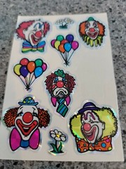 Vintage 80s Foil Stickers Prismatic Clowns Balloons airplanes flowers stick ons