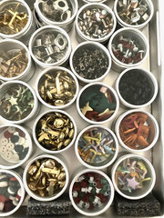 #2 – METAL CASE w/ 40 CONTAINERS – SCRAPBOOKING EMBELLISHMENTS – EYELETS,BRADS++