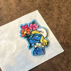 Cartoons & Characters Sticker/Decal – Smurf Girl with Flowers, Multicolor