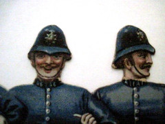 Fantastic Vintage Die Cut of Five British Peace Officers Locking Arms *