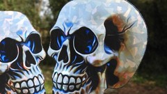 Pack of 2 – 4″ HOLOGRAPHIC Facing SKULLS Stickers BIG 4 inch skull STICKERS