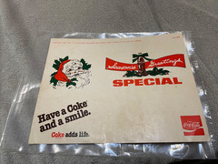 Have a Coke and a Smile Advertising Paper Seasons Greetings Special (read)