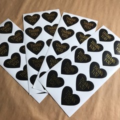 50 Heart Shaped Thank You Stickers On Glossy Black Paper With Gold Lettering