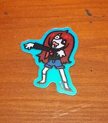 Zombie Girl Sticker Glow in the Dark Red 1 inch