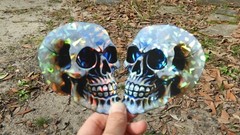 Pack of 2 – 4″ HOLOGRAPHIC Facing SKULLS Stickers BIG 4 inch skull STICKERS