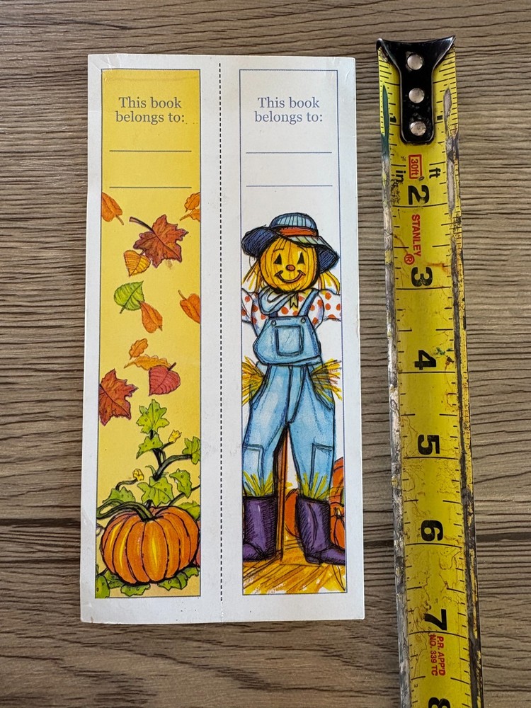 Set of two autumn-themed bookmarks with pumpkin and scarecrow designs