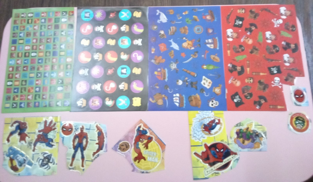 (4) Pirates Stickers and Assorted Spider Man Stickers