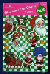 VINTAGE AGC SANTA CLAUS STICKERS 4 SHEETS 48 STICKERS NIP SLED LIST GIFT BAG