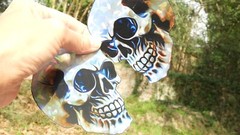 Pack of 2 – 4″ HOLOGRAPHIC Facing SKULLS Stickers BIG 4 inch skull STICKERS