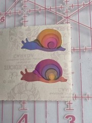 vintage 1980s Sandylion pearlescent snail stickers shiny, colorful