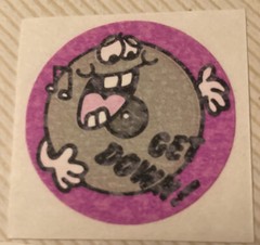 Vintage 1980’s 1.5” matte circle scratch n sniff sticker Get Down!