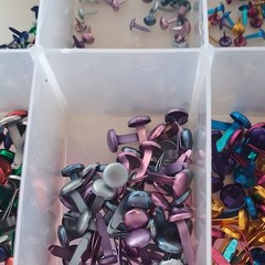 Scrapbooking Embellishments Lot Brads Eyelets in plastic storage box