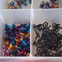 Scrapbooking Embellishments Lot Brads Eyelets in plastic storage box
