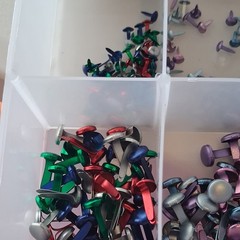 Scrapbooking Embellishments Lot Brads Eyelets in plastic storage box