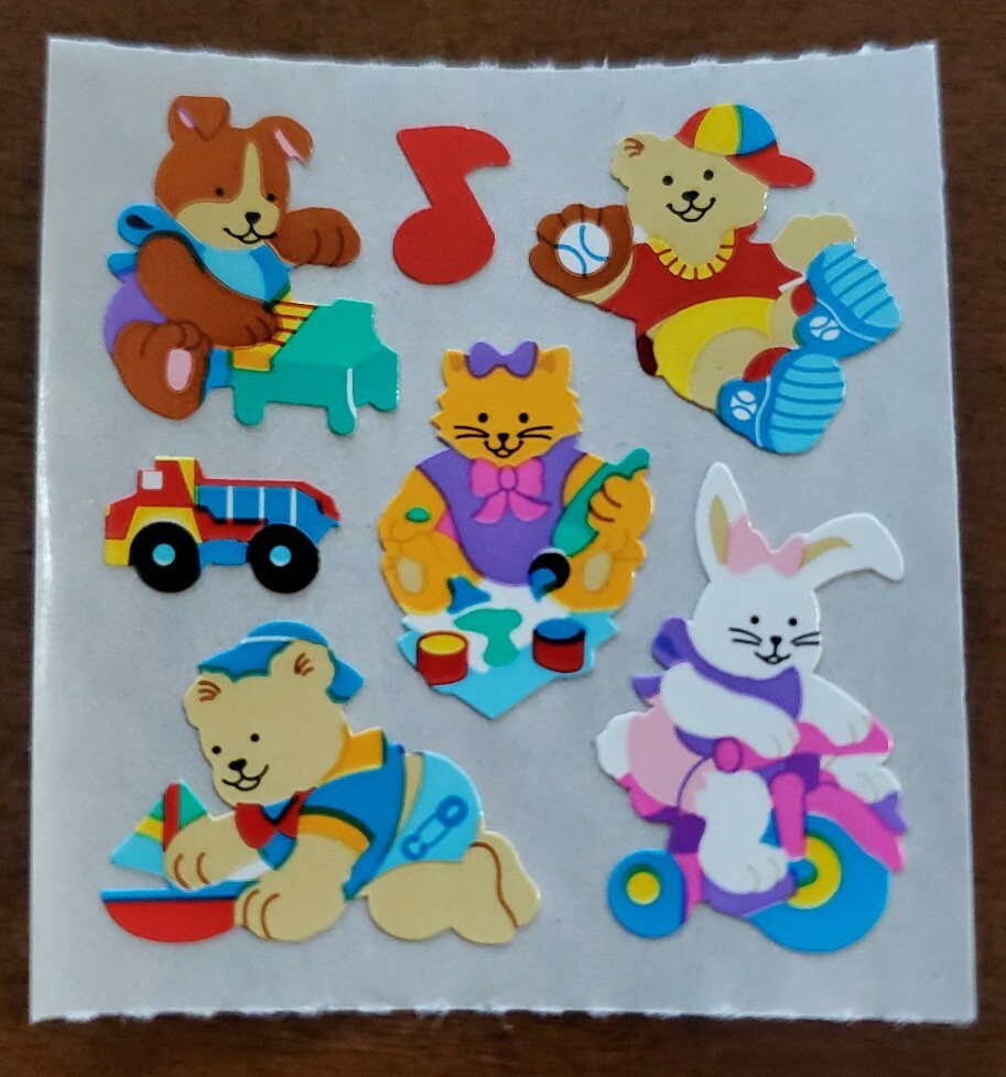 Vintage Sandylion sticker mod, cute animals playing with toys
