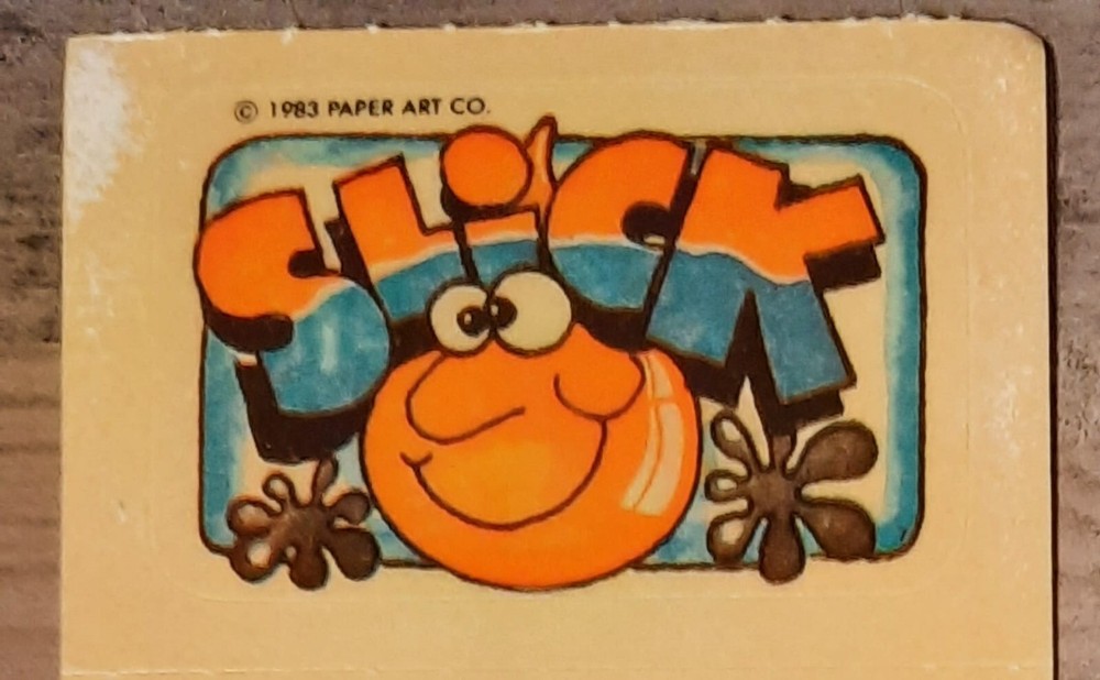 Vintage PAPER ART scratch sniff sticker OIL SLICK
