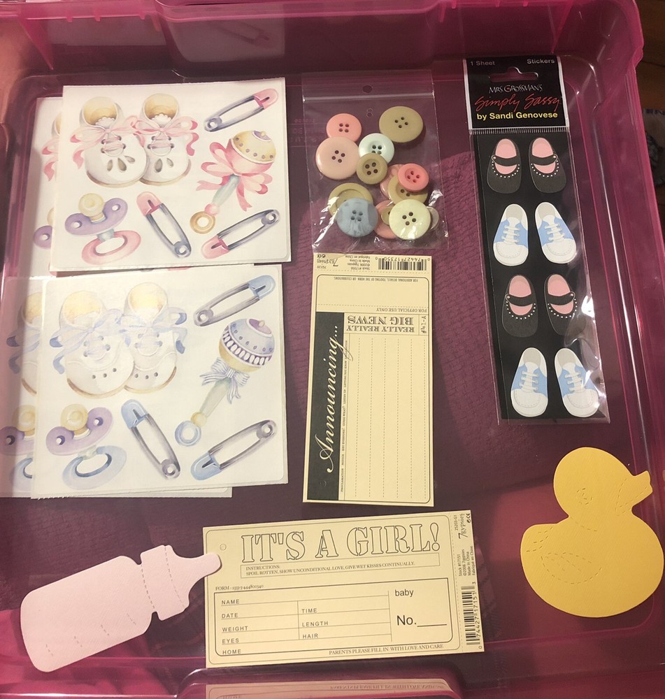 Assorted pastel baby scrapbooking embellishments