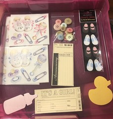 Assorted pastel baby scrapbooking embellishments